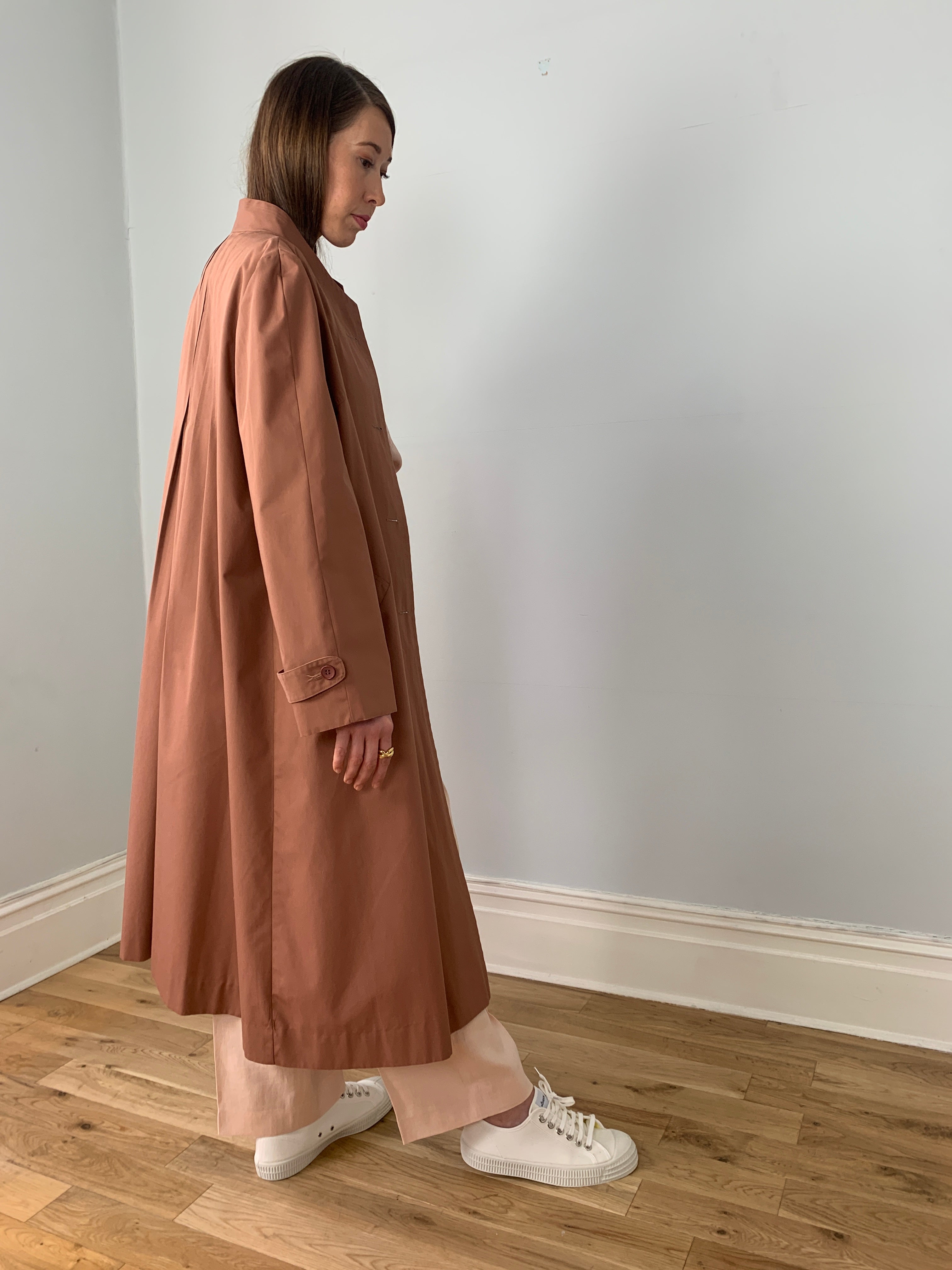 Beautiful vintage Nino swing trench coat with pleat back